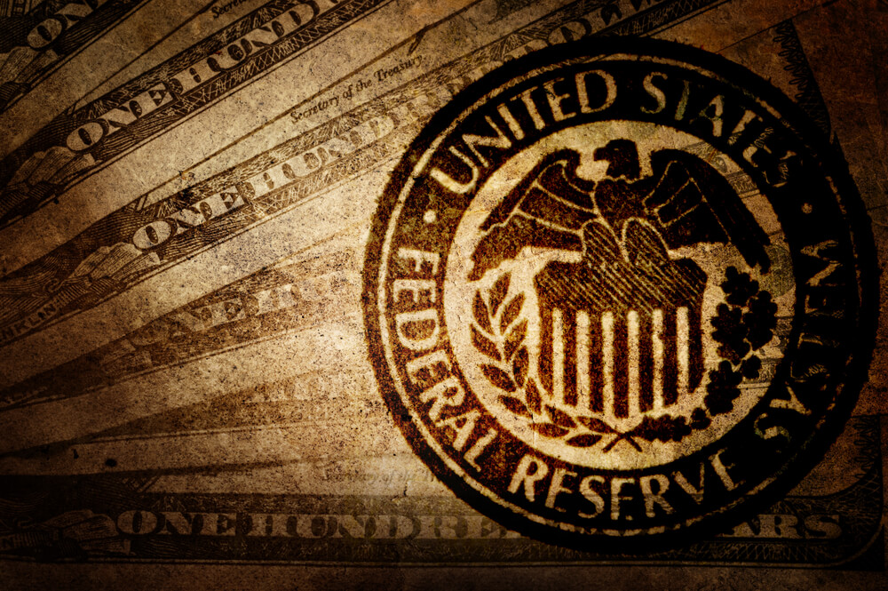 Fed Sees Low Rates Well Into Future and Excites Wall Street