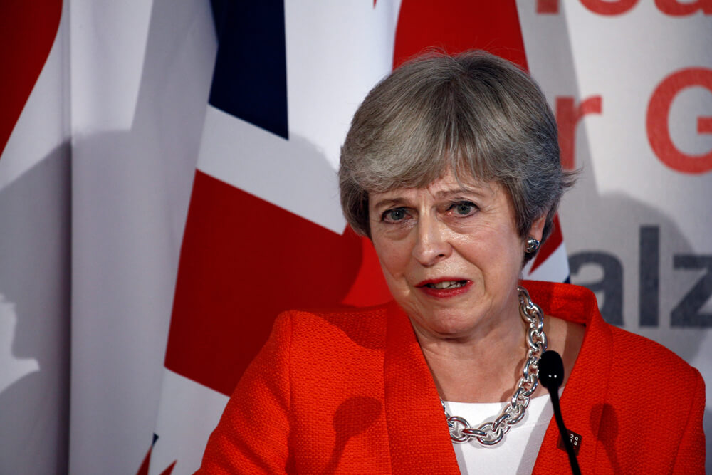 Theresa May Desperate for Brexit Deal Before Economy Tanks