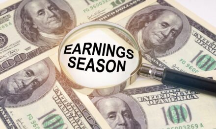 Earnings Season displayed over 100 dollar bills