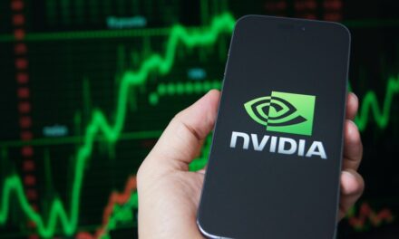 NVDA logo on Phone and stock rising NVDA earnings