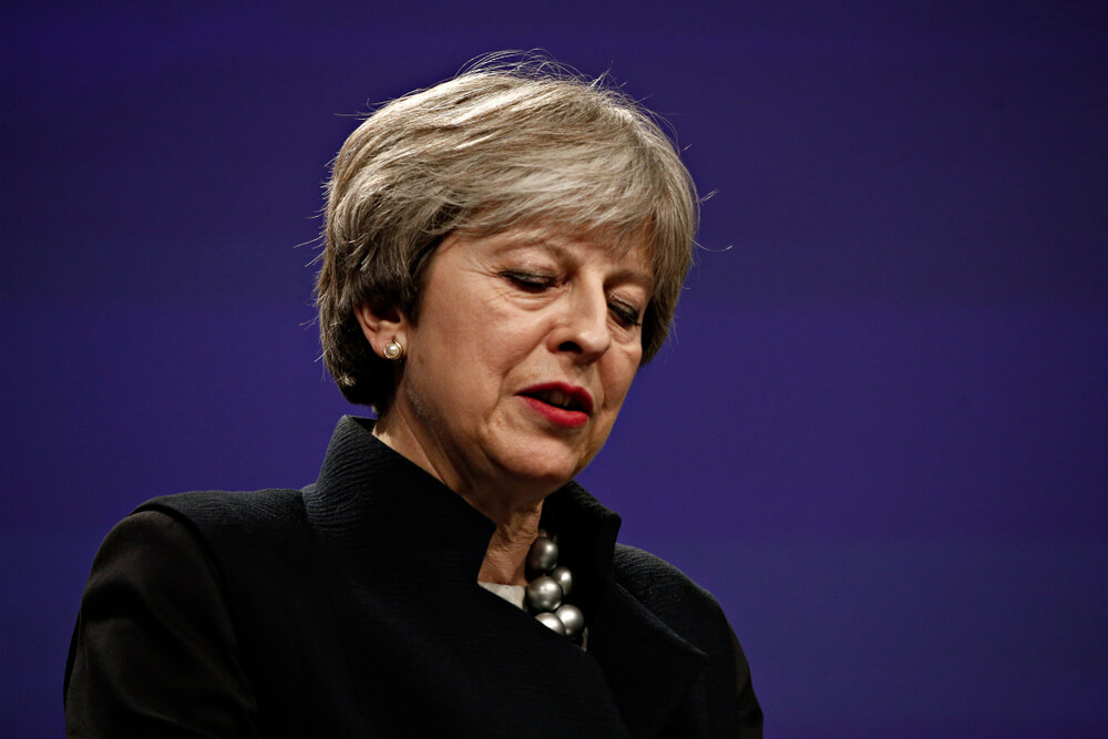 UK PM Theresa May: Hoarse, Beaten Down but Won’t Give up on Brexit