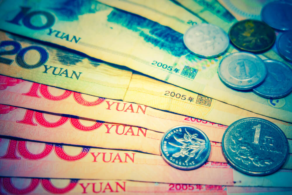 China Lowers Yuan in Risky Currency Manipulation Game